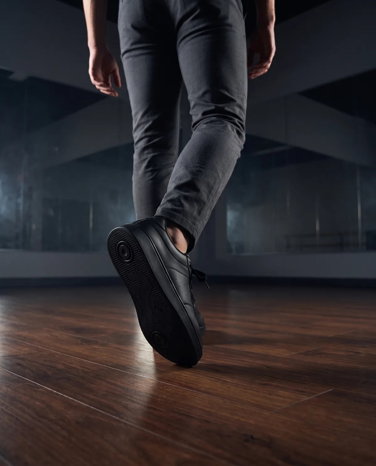 A dancer in Pulse Dance Shoes on a studio floor.